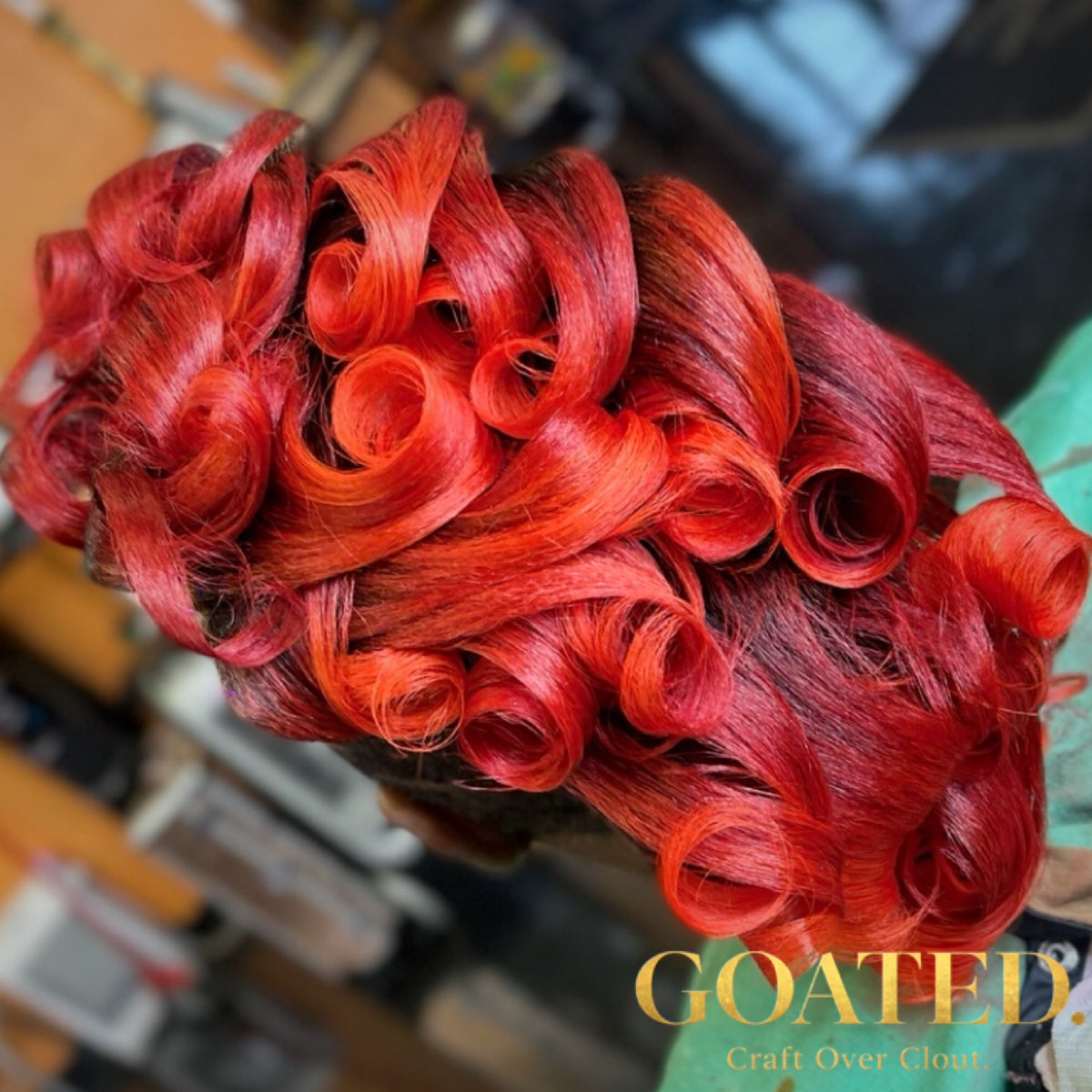 Women's red color and sculpted curls by Bobby Harris using Alpha Series Pro